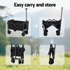 Black folding garden trolley cart with pull handle and fabric carry bag